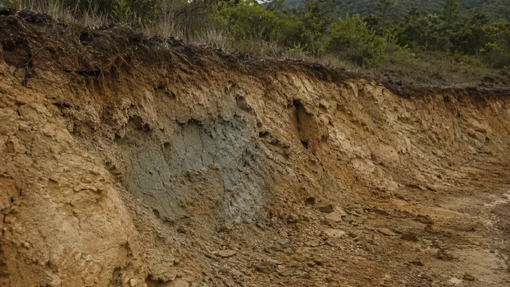 Exposed clay and rock layers representing clay-type lithium exploration in Yunnan