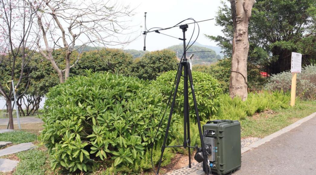 iSpecSIF system deployed on a tripod for long-term vegetation monitoring